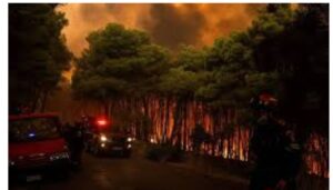 Helicopters collide in Greece as fires spread