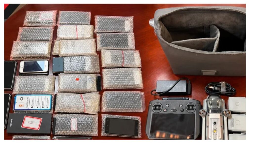 JKIA cleaner arrested by KRA carrying bags containing 52 phones, three drones